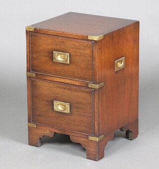 A military style mahogany and brass banded bedside chest of 2 drawers with brass counter sunk handles and brass carrying handles to the sides 61cm h x 40cm w x 40cm d 