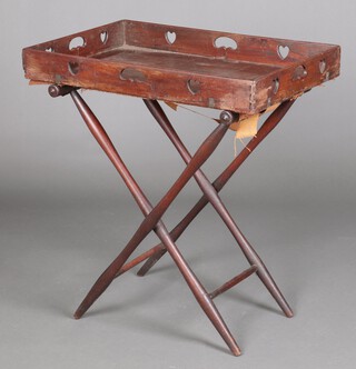 A 19th Century rectangular twin handled butler's tray with carved pierced heart decoration to the side, raised on a mahogany base 83cm h x 76cm w x 50cm d  