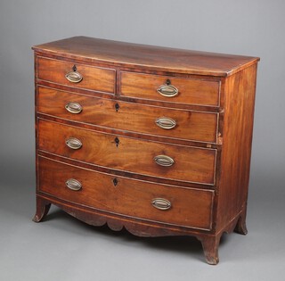 A Georgian inlaid mahogany bow front chest of 2 short and 3 long drawers with replacement oval drop handles, raised on splayed bracket feet 90cm h x 101cm w x 49cm d 