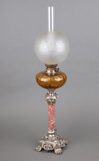 An amber glass oil lamp reservoir raised on a veined marble column and pierced silver Rococo style foot, complete with glass shade and chimney 73cm h x 14cm 