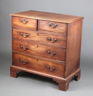 A Georgian mahogany chest of 2 short and 2 long drawers with brass swan neck drop handles, raised on bracket feet 92cm h x 90cm w x 51cm d 