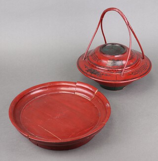 A Chinese circular red lacquered dish with detachable lid, the body with Grecian key and floral decoration 39cm h x 29cm diam. together with a circular bowl with raised rim 7cm x 33cm  