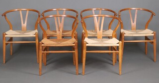 Hans Wegner Danish (1914-2007) for Carl Hanson, a set of 6 mid-century and later Danish wishbone easy chairs in oak, the seats upholstered in cord 73cm h, 3 marked Made in Denmark by Carl Hanson and Son Odense Denmark, 3 with silver Carl Hanson stickers 