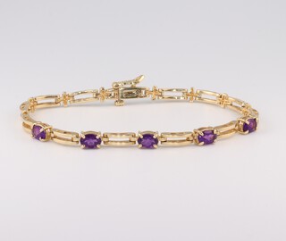 A 14ct yellow gold amethyst bracelet, 1.0ct, 18cm, 10.9 grams
