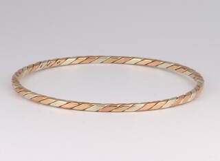 A 9ct 2 colour gold bangle, 6.5cm diam, 12.9 grams 