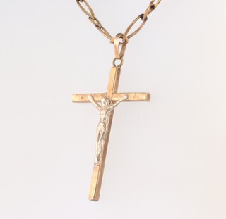 A 9ct yellow gold necklace 69cm and a ditto crucifix pendant 15.2 grams 