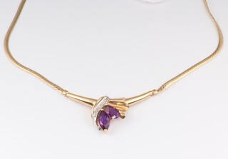 A 14ct yellow gold necklace set with 2 pear cut amethysts 2.0ct and 5 brilliant cut diamonds 0.03ct, 40cm, 10 grams 
