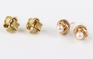 Two pairs of 9ct yellow gold ear studs, 2.5 grams gross