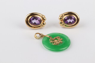 A pair of 14ct yellow gold amethyst ear studs and a gold mounted hardstone pendant, gross weight 6.4 grams 