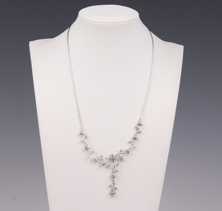 A CHOW TIA FOOK 18ct white gold and diamond floral necklace comprising 51 brilliant cut diamonds (14 x 0.03ct, 31 x 0.05ct and 6 x 0.10ct, approx. 2.50ct) 43cm long, 12 grams 