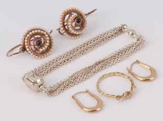 A pair of 9ct yellow gold hoop earrings 0.5 grams, a silver bracelet, a pair of gilt earrings and a gilt ring 