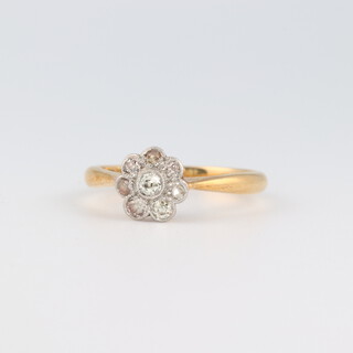An Edwardian 18ct yellow gold 8 stone diamond cluster ring, the 8 brilliant cut diamonds approx. 0.20ct, size K, 2.5 grams 