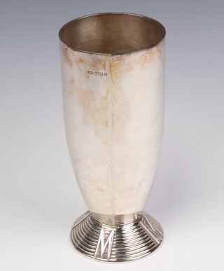A stylish silver vase with ribbed base, initialled M around the base, London 1999, 20cm,  maker Mappin & Webb, 604 grams