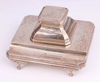 A silver octagonal ink stand with pen tray on claw and ball feet, Birmingham 1918, maker Henry Matthews, 14cm, 368 grams