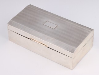 An Art Deco silver engine turned rectangular cigarette box 18cm, rubbed marked, gross weight 584 grams