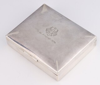 A rectangular Continental silver 835 cigarette box with engraved inscription, 11cm x 9.5cm 