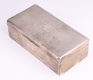 An Art Deco silver engine turned cigarette box 18cm x 9cm, gross weight 432 grams 