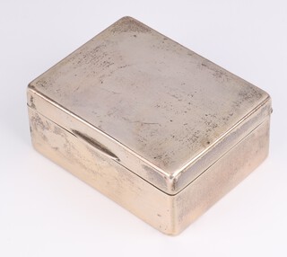 A silver rectangular cigarette box Birmingham 1928, 11cm x 9cm 