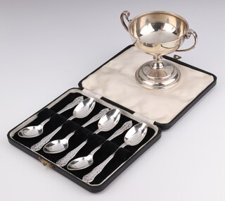 A silver 2 handled trophy cup Sheffield 1938 10cm and a set of 6 Edwardian silver teaspoons Sheffield 1910, 198 grams 