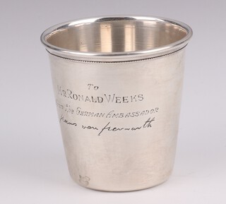 A Continental silver beaker with presentation inscription 7cm, 60 grams