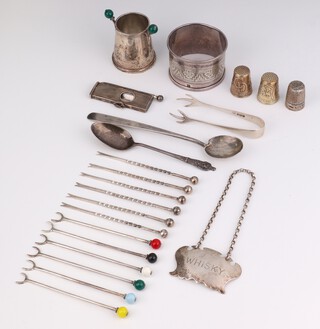 A Continental silver 2 handled pot with bead handles 4.5cm, a napkin ring, pair of sugar nips, 2 spoons, spirit label, 3 thimbles, cigar cutter and 12 cocktail sticks, gross weight 176 grams 