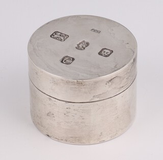 A circular silver trinket box London 1977, maker Christian St John Ltd., 5cm, 76 grams