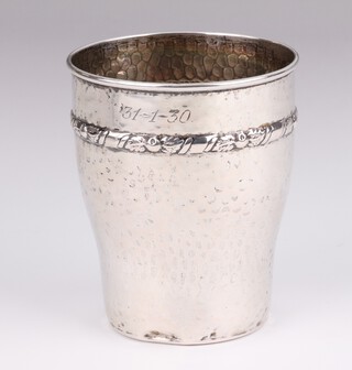 A Danish silver hammer pattern beaker with engraved inscription 9cm, 44 grams