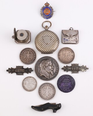 A silver plated  pocket telescope 6cm, a silver and enamelled stamp holder, 3 brooches and other curios