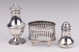 An Edwardian silver pepperette Birmingham 1900, 1 other and a mustard frame, 68 grams
