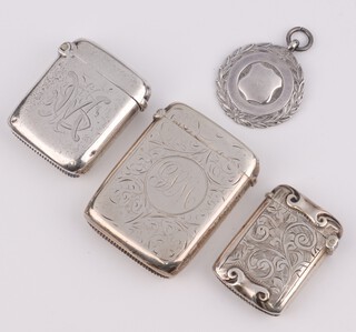 A Victorian silver vesta case with engraved monogram Birmingham 1896, 2 others and a silver fob, gross weight 72 grams 