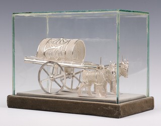 An Indian silver filigree model of 2 Oxen pulling a wagon 15cm, 166 grams 