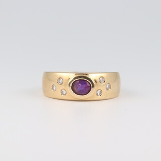 A 14ct yellow gold  amethyst and diamond ring, the amethyst 0.25ct (chipped) with 6 diamonds (0.04ct), size N, 3.8 grams 