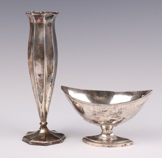 A Continental silver boat shaped table salt 10cm and a fluted vase, weighable silver 58 grams