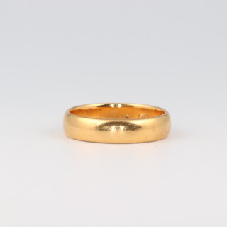 A 22ct yellow gold wedding band, size L, 4.4 grams 