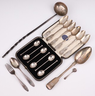 A George IV silver table spoon London 1827, a set of 6 tea spoons, 6 coffee spoons, a spoon, fork, mustard spoon and whalebone handled punch ladle, weighable silver 242 grams 