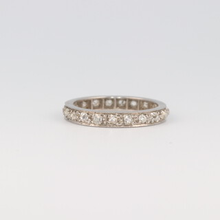 A platinum diamond eternity ring, approx. 0.20ct, size K 1/2, 3.5 grams 