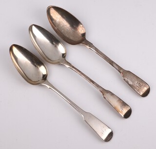 Three George III table silver table spoons with engraved initial, London 1808 and 1830, 212 grams 