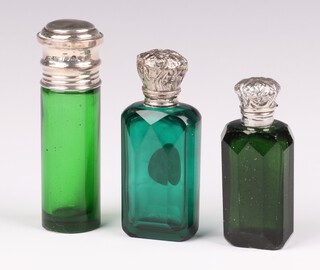 A silver mounted green glass scent bottle London 1860 8cm, ditto 7cm and a faceted ditto Birmingham 1899 6cm 