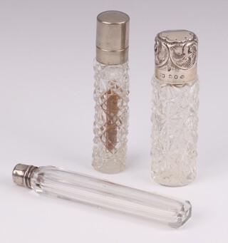 A Victorian silver mounted cut glass scent Birmingham 1894, 8cm, an unmarked ditto 8.5cm and 1 other 10cm 