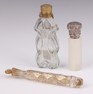 A Victorian opaque glass scent with repousse silver lid Birmingham 1893 8cm, a flattened ditto with brass mount and a faceted gilt glass ditto 15cm 