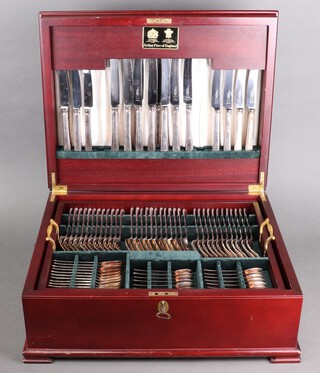 A canteen of Arthur Price silver plated cutlery comprising 12 dinner knives, 12 dessert knives, 12 dinner forks, 12 dessert forks, 12 cake forks, 12 coffee spoons, 12 tea spoons, 12 dessert spoons, 8 table spoons, a pair of servers, 12 soup spoons, 12 fish knives, 12 fish forks, a cheese knife, cake slice, a small and a large ladle, contained in a mahogany finished canteen 