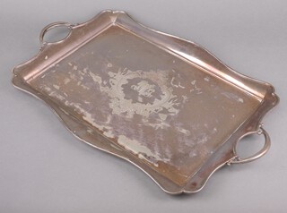 An Edwardian silver plated 2 handled serpentine tray with engraved monogram 64cm 