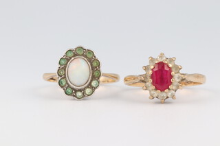 Two 9ct yellow gold gem set rings, sizes L and L 1/2, 5.3 grams 