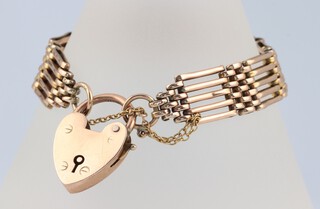 A 9ct yellow gold gate link bracelet with heart shaped padlock, 16cm, 19.8 grams 