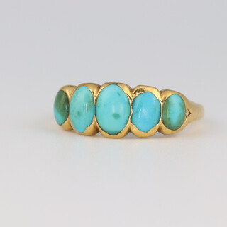 A 14ct yellow gold 5 stone turquoise ring, size P, 4 grams 