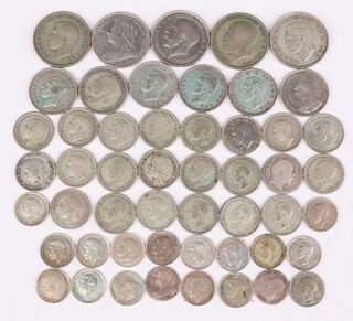 A quantity of pre 1947 coinage including 2 shillings, 1 shilling, threepenny bits, 174 grams 