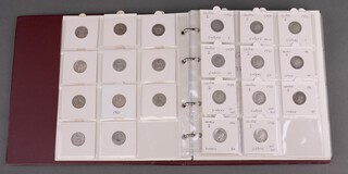An album of sixpences including Edward VII 1902, George V, George VI, Elizabeth II 