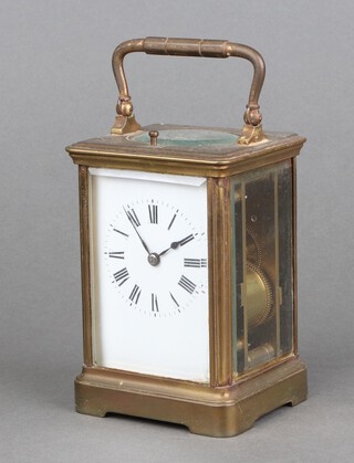 A 19th Century French 8 day striking carriage clock with 6cm enamelled dial, Roman numerals, the back plate numbered 2034, contained in a gilt metal case, complete with key 12cm h x 9cm w x 7cm d 