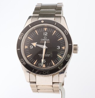 A gentleman's steel cased Omega Seamaster wristwatch with black rotating bezel and black dial, the case marked Seamaster 300 SI14.300M/1000 feet, Liquid Metal and Technologies 15000 gauss, the movement marked Omega Coaxial 8400, contained in a 38mm case on an Omega bracelet numbered STZ001154 with original wooden box and outer cardboard box, 4 extra links, instruction booklet, International Warranty dated 30/04/2020 no.87490656 and Pictogram card no.87490656 