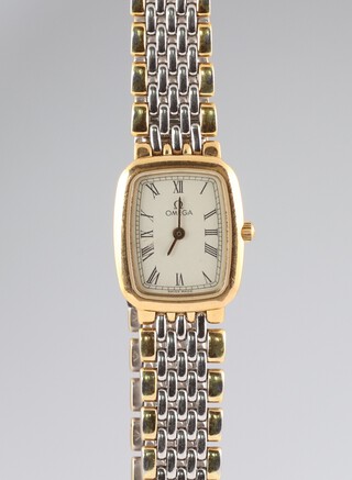 A lady's bi-metallic Omega wristwatch with quartz movement, contained in an 18mm case